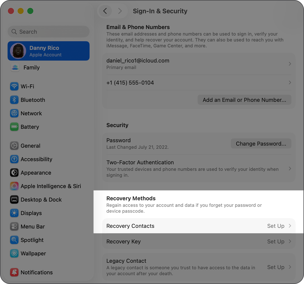 Mac showing System Settings and how to add a Recovery Contact.