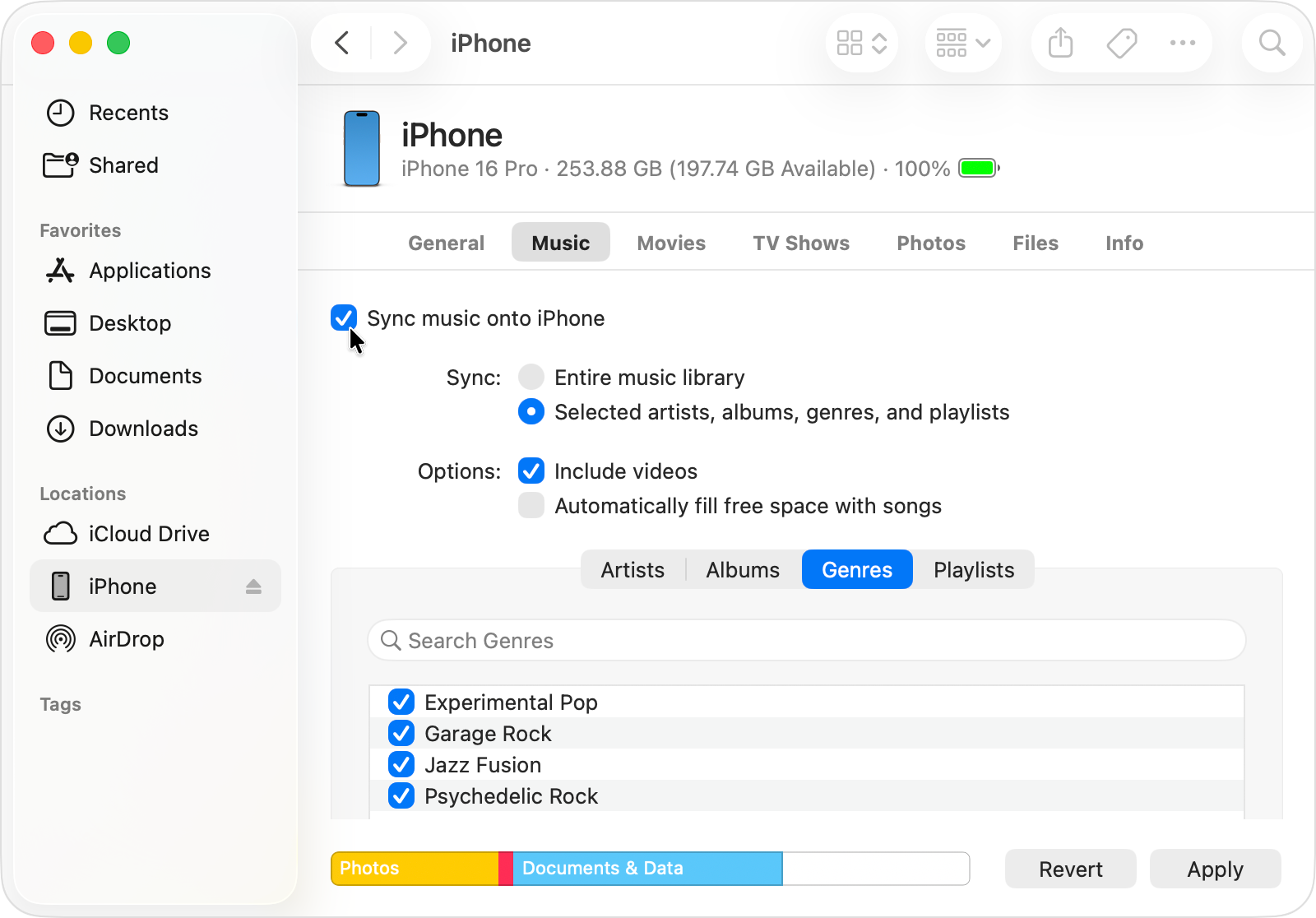 Music sync settings for a connected iPhone in the Finder with Genres selected.