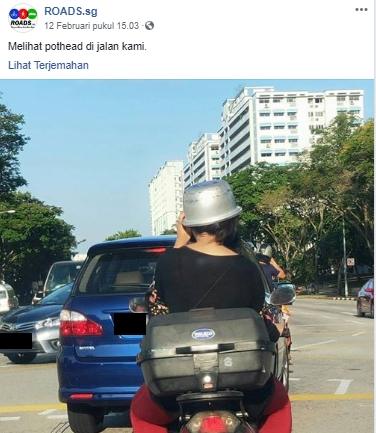 Pengendara pilih pakai panci rice cooker ketimbang helm. (Facebook/ROADS.sg)