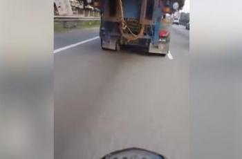 Pemotor Melaju Lewat Kolong Truk, Bikin Panik Sopir dan Dihujat Warganet